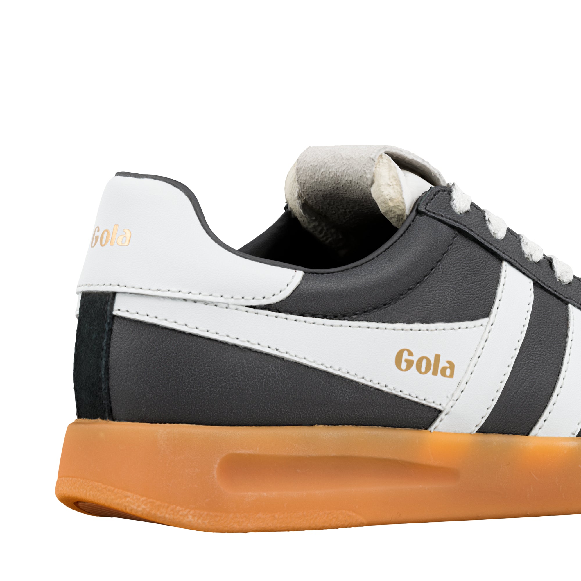 Close up of the heel and side of a black and white Gola trainer with a gum sole