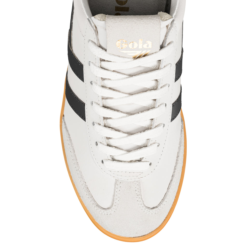 Top view of a white Gola trainer with black side stripes and a gum sole