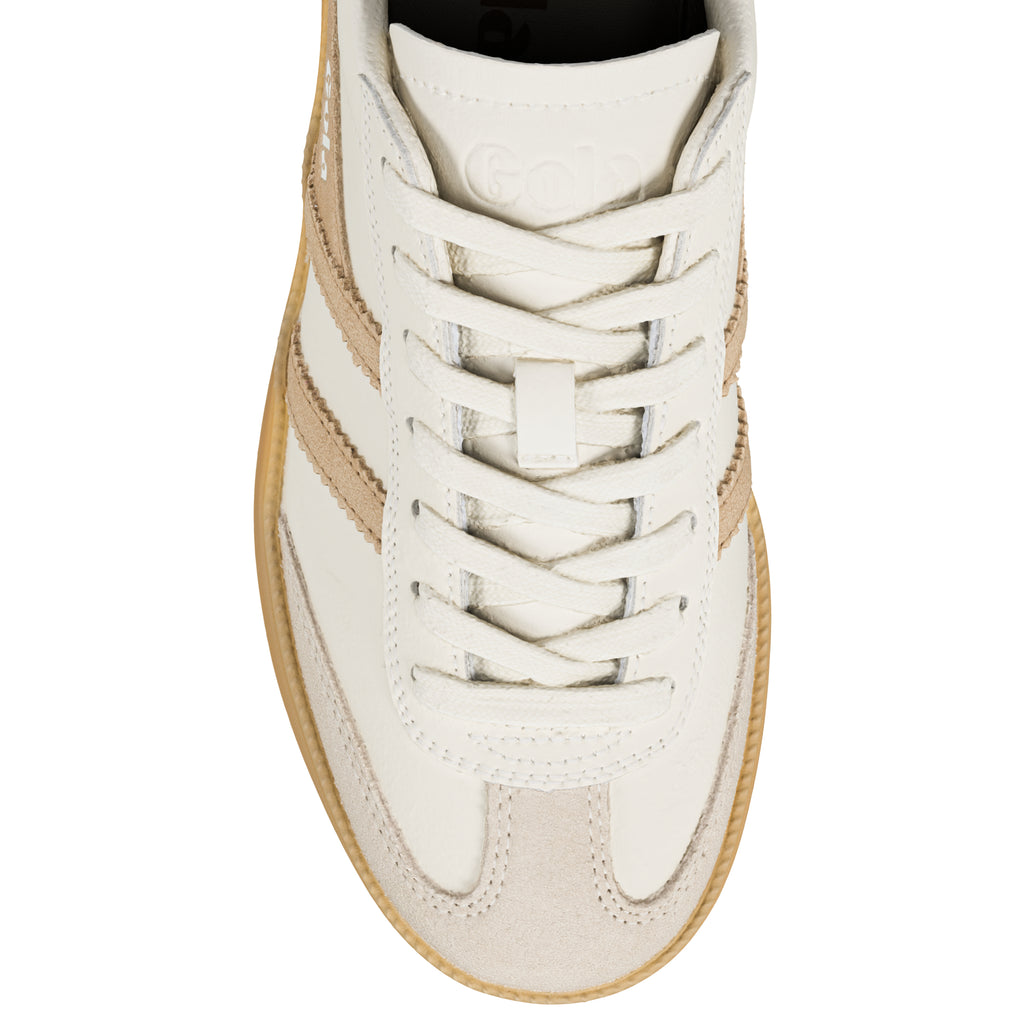 Off white leather trainer with beige suede detailing and gum rubber sole