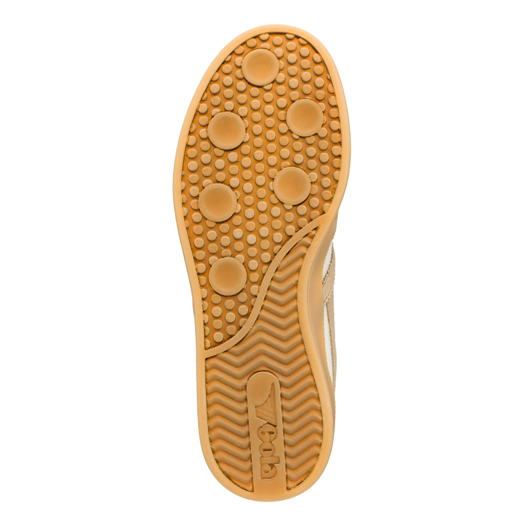 Tan rubber trainer sole with circular tread pattern and Gola branding