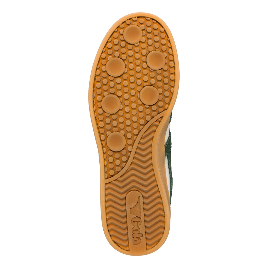Brown rubber trainer sole with circular tread pattern and Gola branding