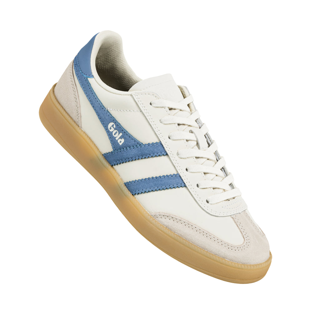 Off-white leather trainer with blue suede side stripes and a gum sole