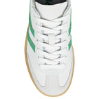 White leather trainer with green side stripes and gum sole