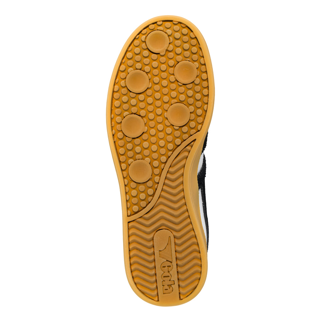 Tan rubber trainer sole with circular grip pattern and Gola branding