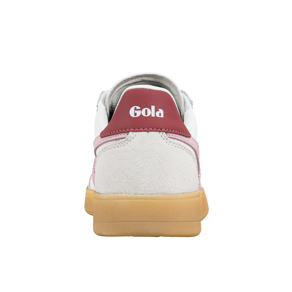 Rear view of a white and pink Gola trainer with a gum sole