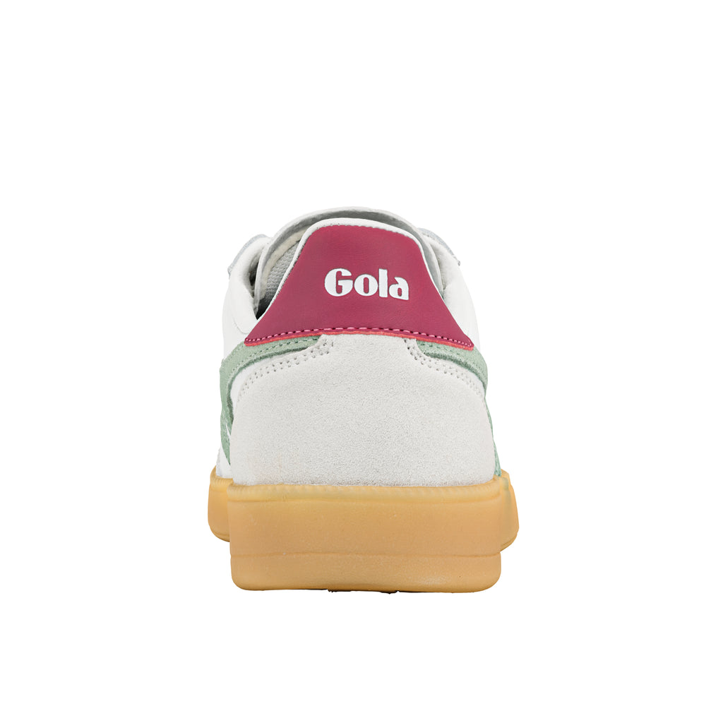 Rear view of a white and green Gola trainer with a gum sole
