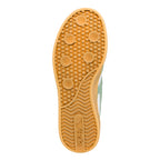 Gum rubber trainer sole with circular tread pattern and Gola branding