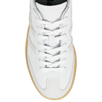 Top view of a white Gola trainer with a gum sole