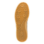 Tan rubber trainer sole with circular tread pattern and Gola logo