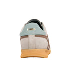 Rear view of a beige suede trainer with a light blue heel tab and gum sole