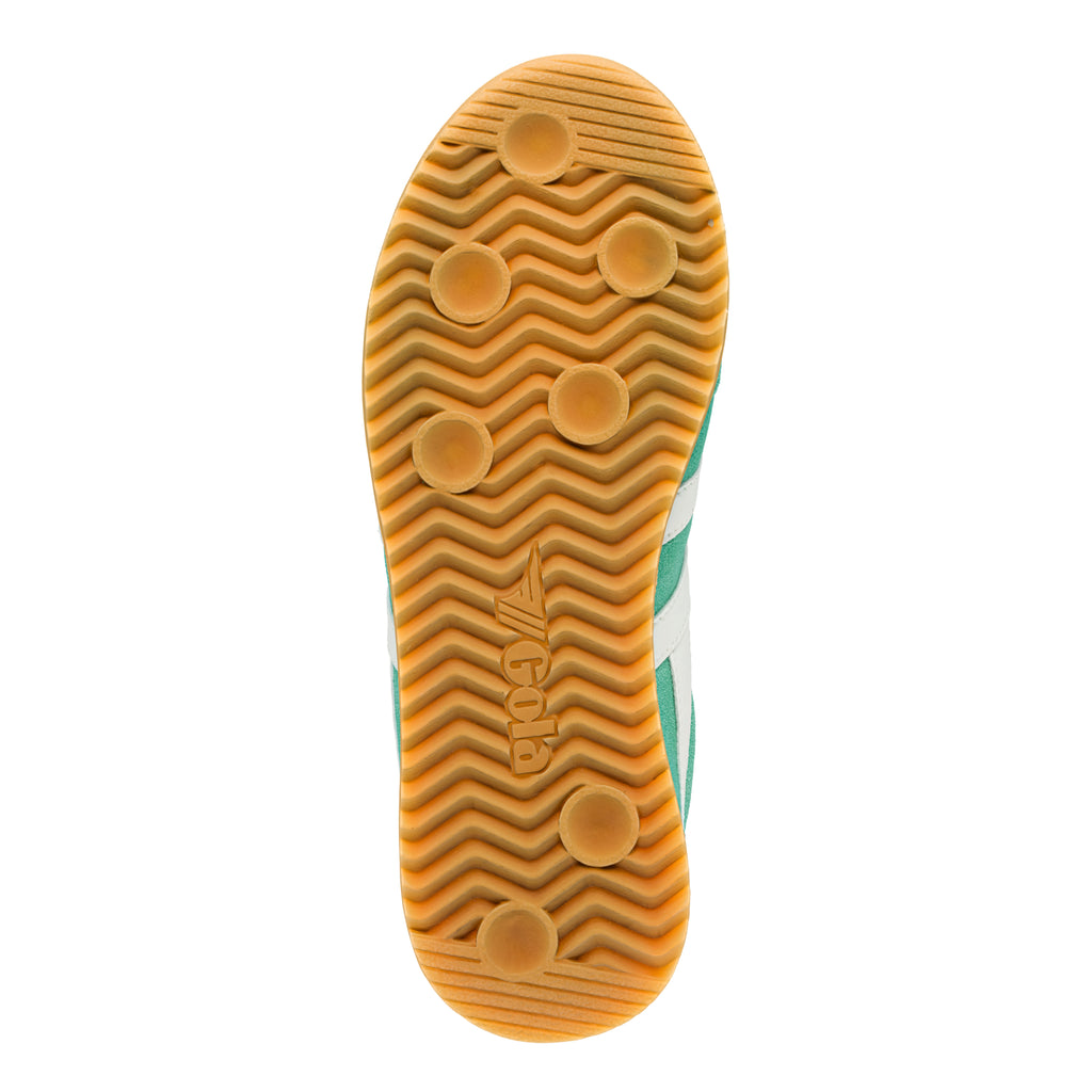 Gum rubber trainer sole with wavy tread pattern and Gola logo