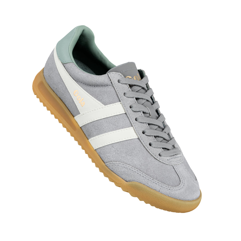 Grey suede Gola trainer with white side stripes and gum sole