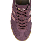 Top view of a plum suede Gola trainer with gold branding and gum sole