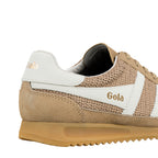 Close up of the heel and side of a beige and white Gola trainer with a gum sole