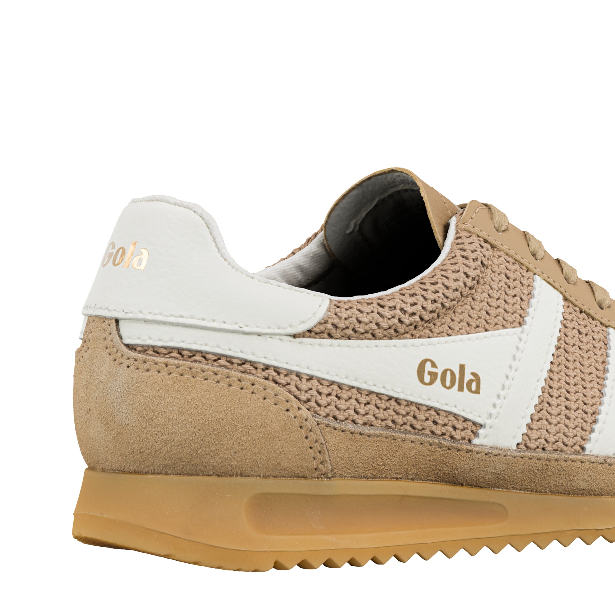 Close up of the heel and side of a beige and white Gola trainer with a gum sole