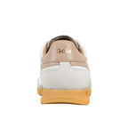 Rear view of a white and beige Gola trainer with a gum sole