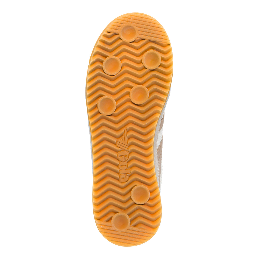 Gum rubber trainer sole with chevron tread pattern and Gola branding