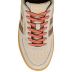 Top view of a beige Gola trainer with brown accents and orange laces