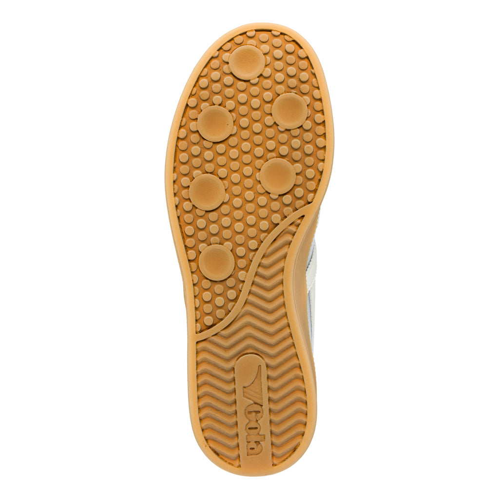 Gum rubber trainer sole with circular tread pattern and wave grip