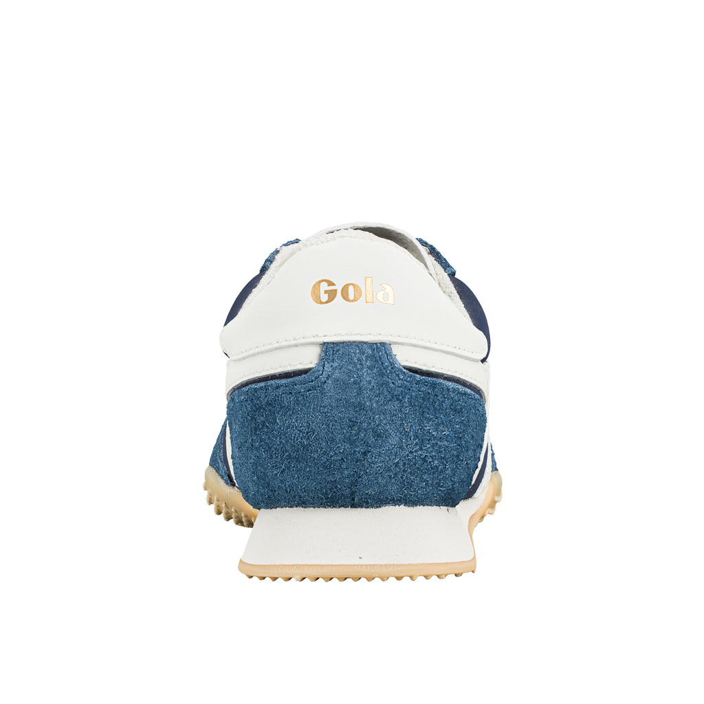Rear view of a blue and white Gola trainer with a gum sole