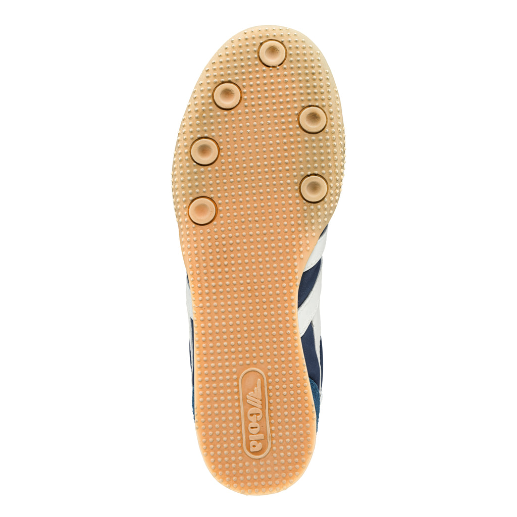 Gum rubber sole of a trainer with circular grip pattern and Gola branding