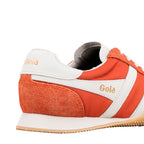 Close up of orange and white Gola trainer heel