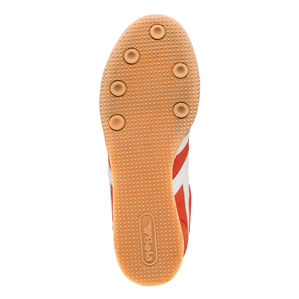 Tan rubber trainer sole with circular grip pattern and Gola branding