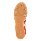Tan rubber trainer sole with circular grip pattern and Gola branding