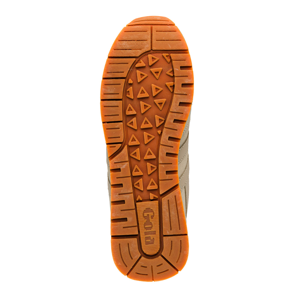 Rubberised gum sole of a Gola trainer with triangular tread pattern