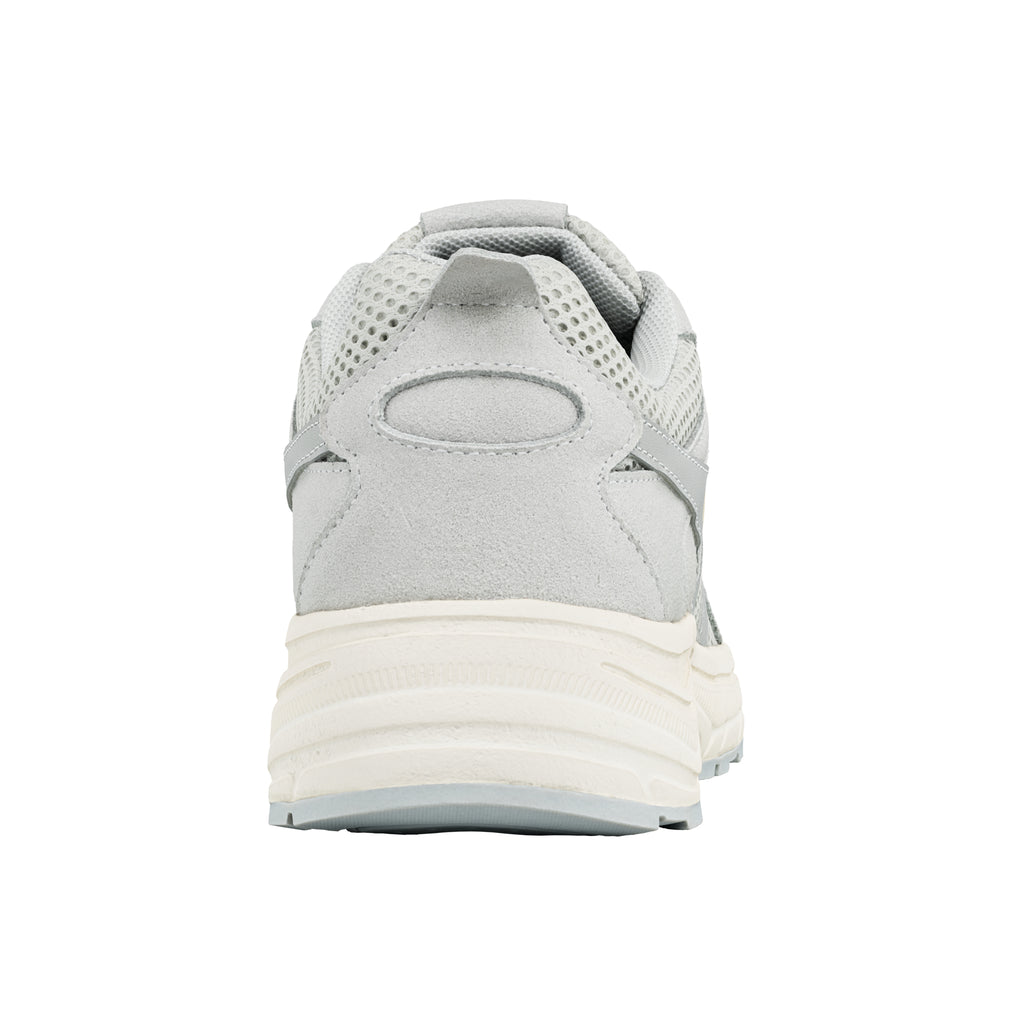 Rear view of a grey mesh trainer with a cream sole