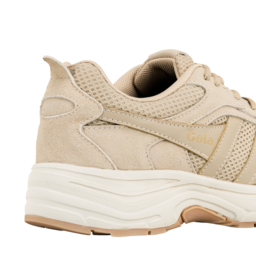 Beige Gola trainer showing the heel and side panel detail