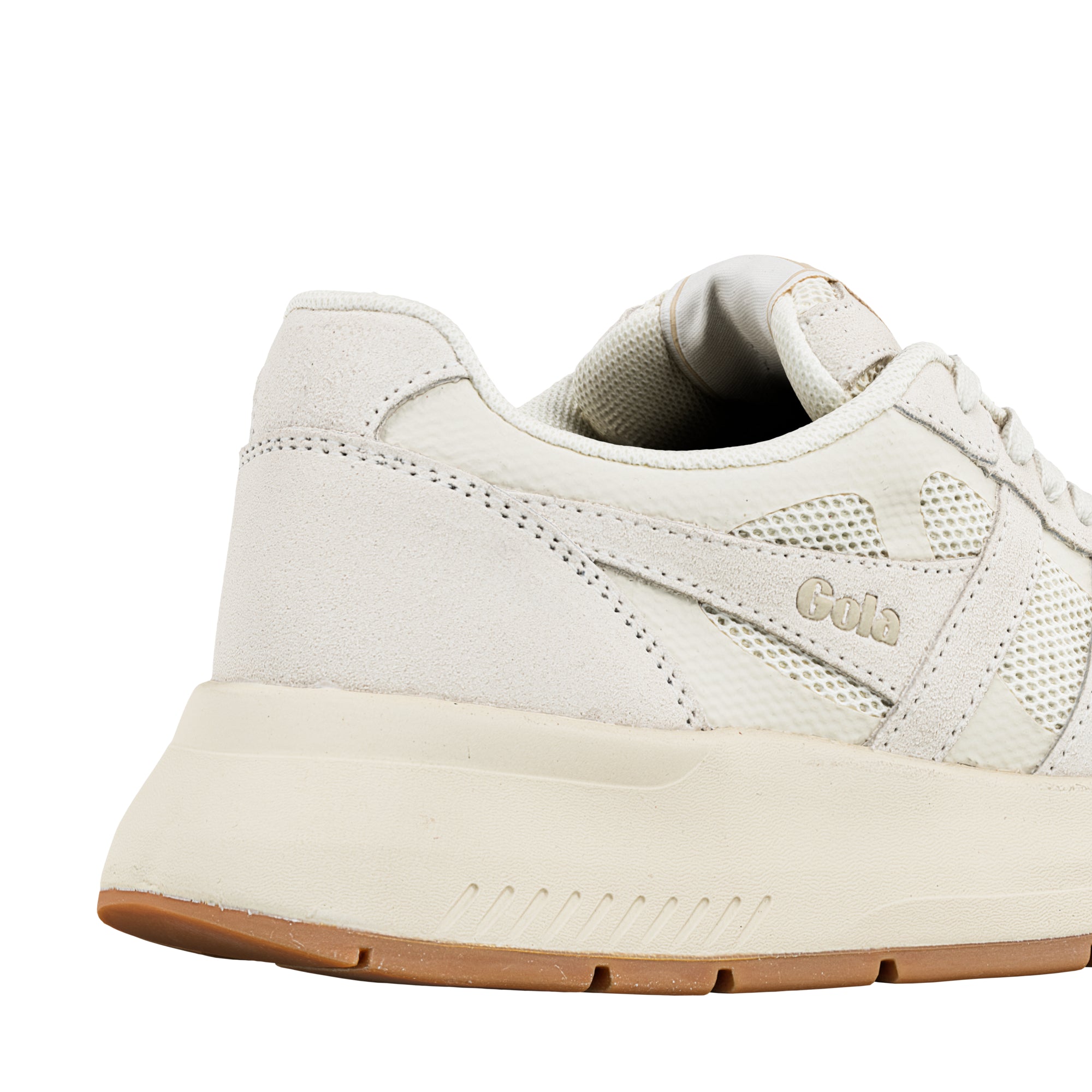 Close up of the heel and side panel of a cream coloured Gola trainer with mesh detailing and a gum rubber sole