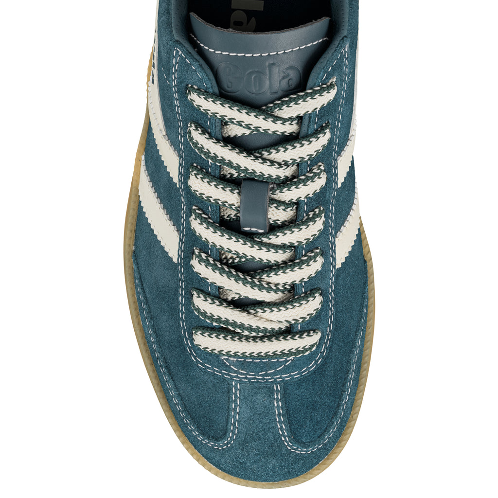 Top view of a blue suede Gola trainer with white side stripes and patterned laces
