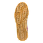 Tan rubber trainer sole with circular grip pattern and Gola branding