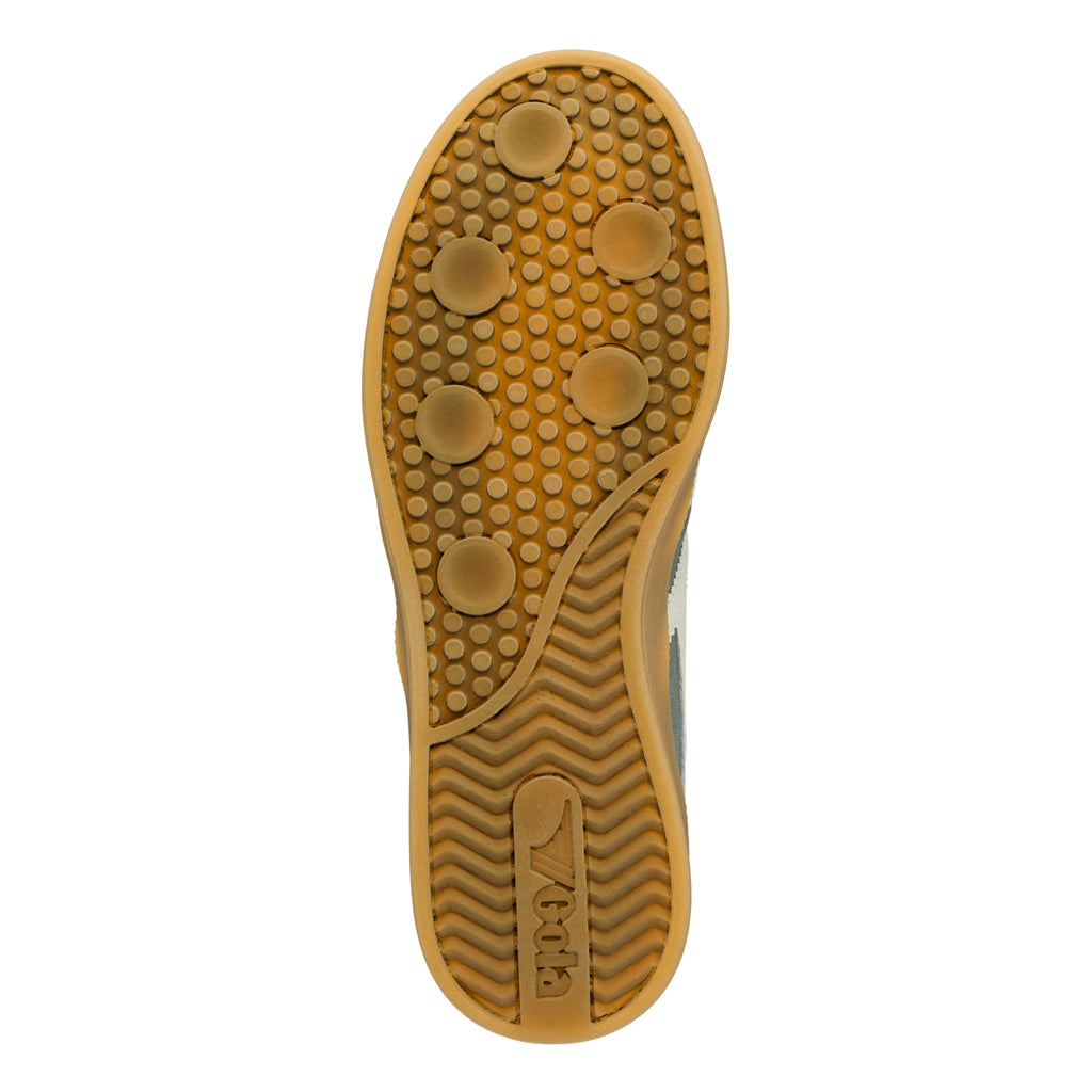 Brown rubber trainer sole with circular grip pattern and Gola logo
