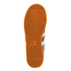 Brown rubber trainer sole with herringbone tread pattern and Gola logo