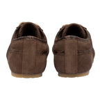 Pair of brown suede shoes, rear view