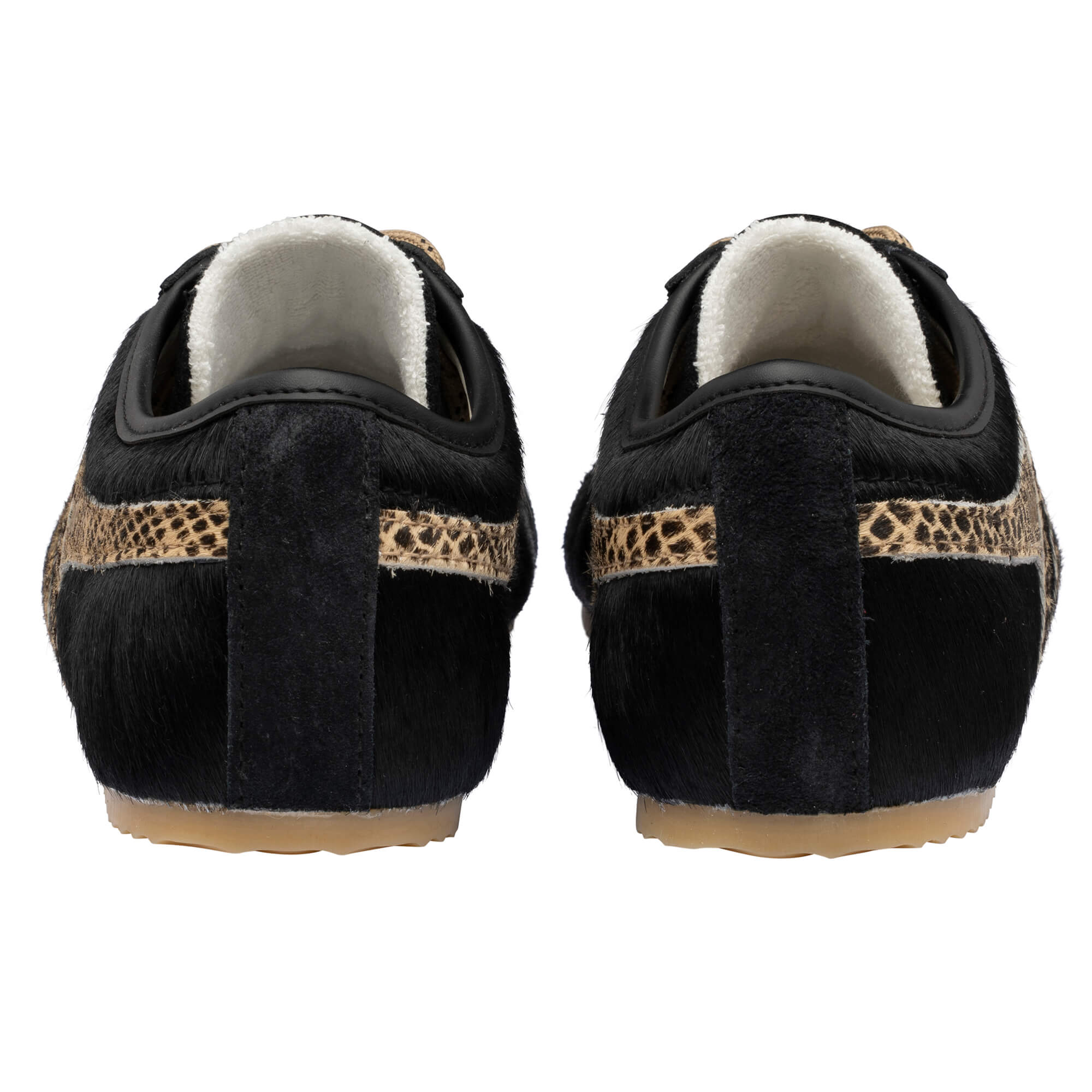 Pair of black pony hair trainers with leopard print stripe, rear view