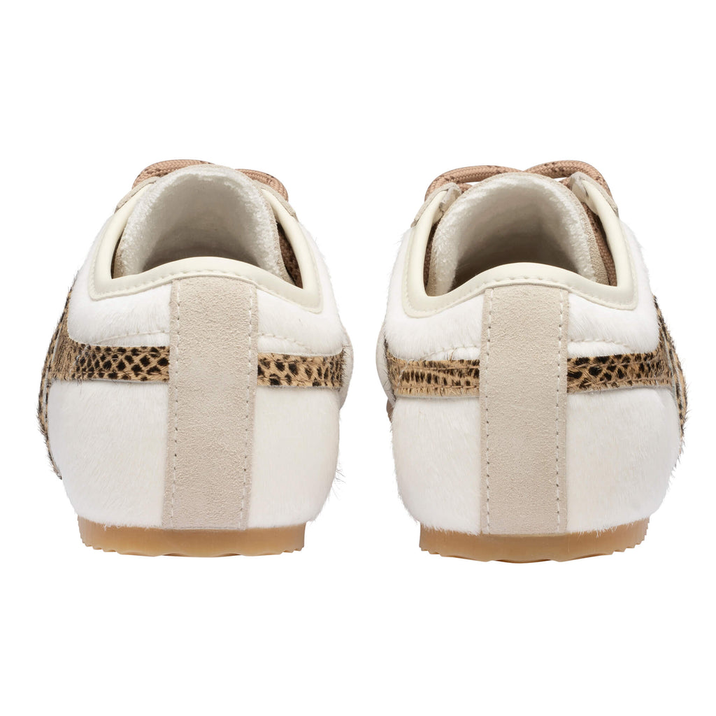 Rear view of two white trainers with leopard print trim and beige suede details