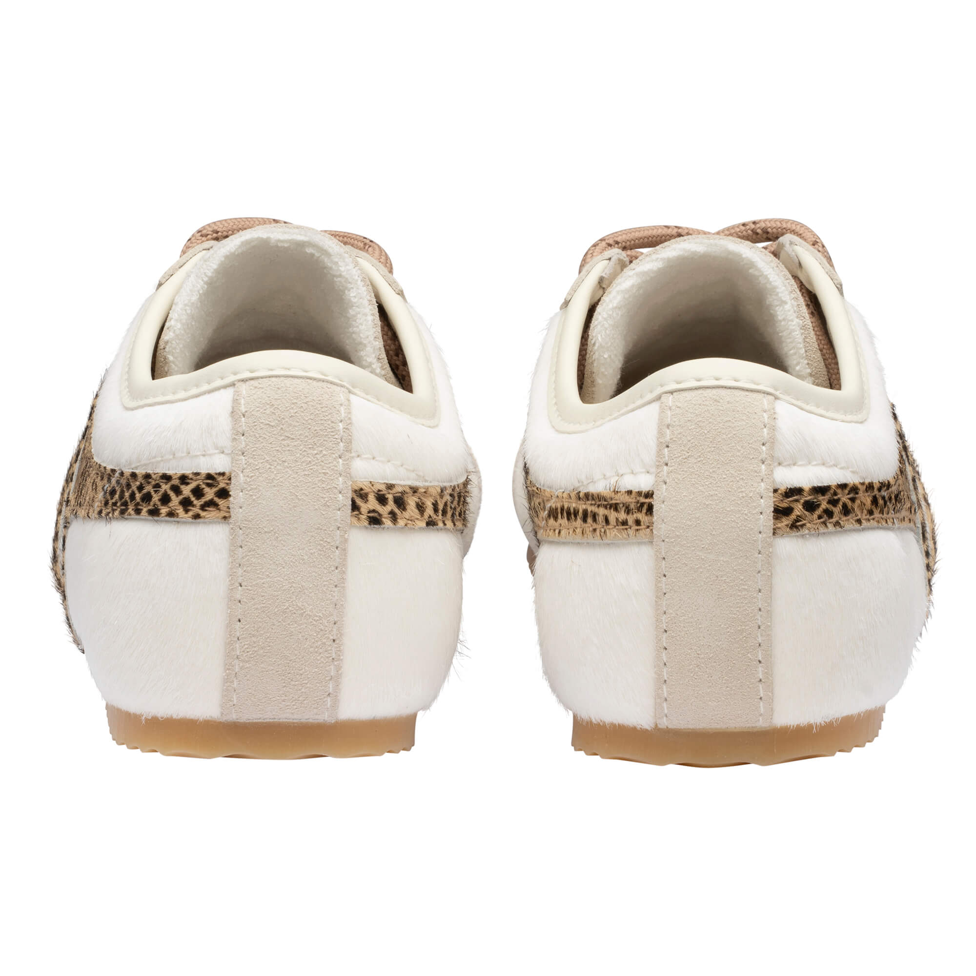 Rear view of two white trainers with leopard print trim and beige suede details