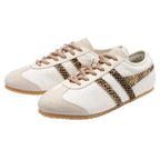 Pair of Gola Harrier trainers in off-white with leopard print side stripes and beige laces