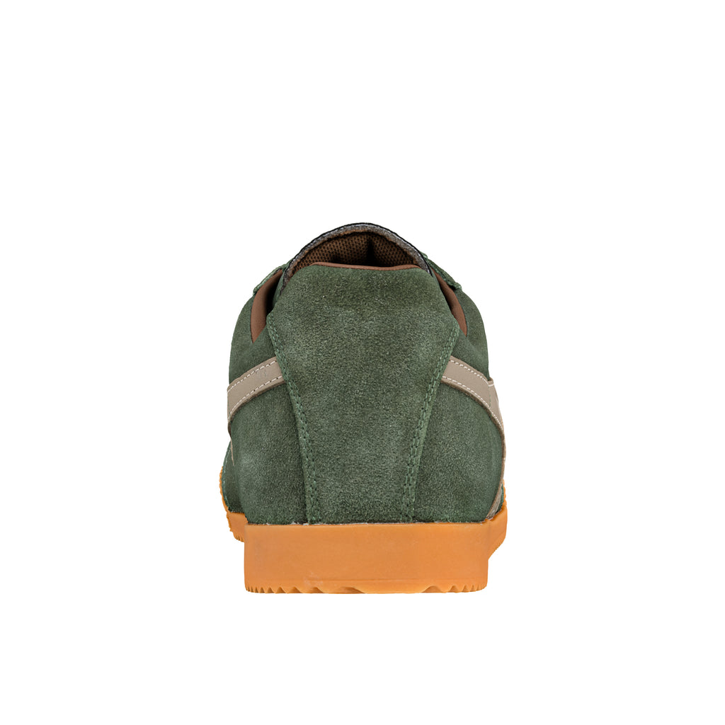 Rear view of a green suede trainer with a gum rubber sole