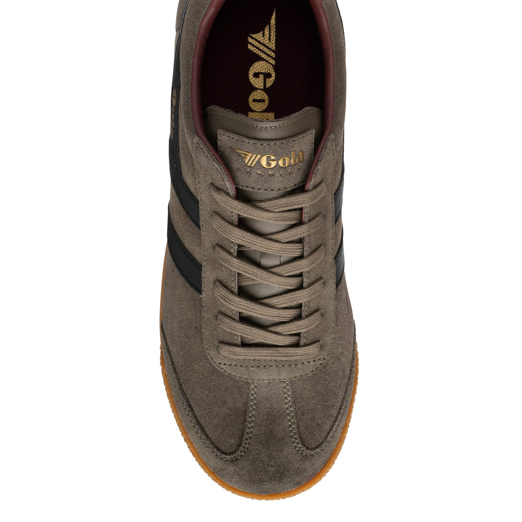 Top view of a khaki suede Gola trainer with black side stripes and a gum rubber sole