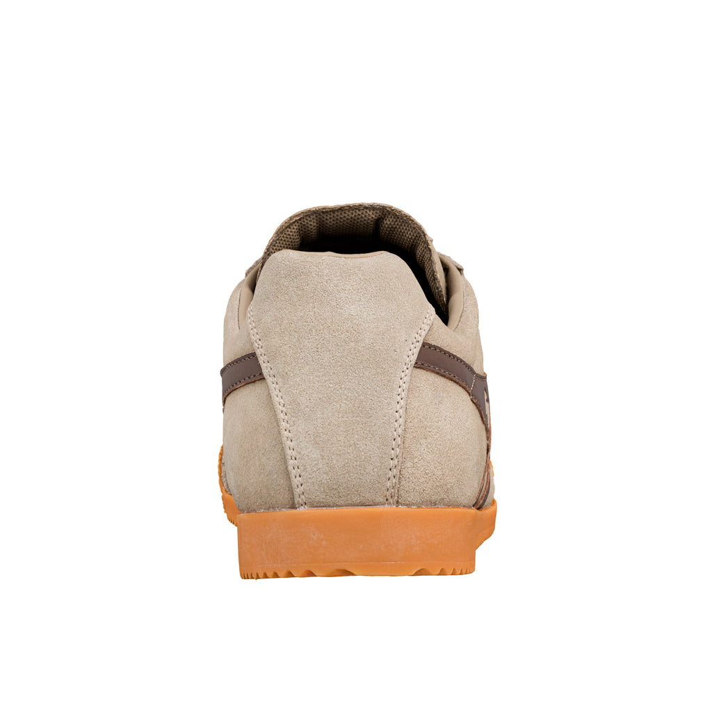 Rear view of a beige suede trainer with a gum rubber sole