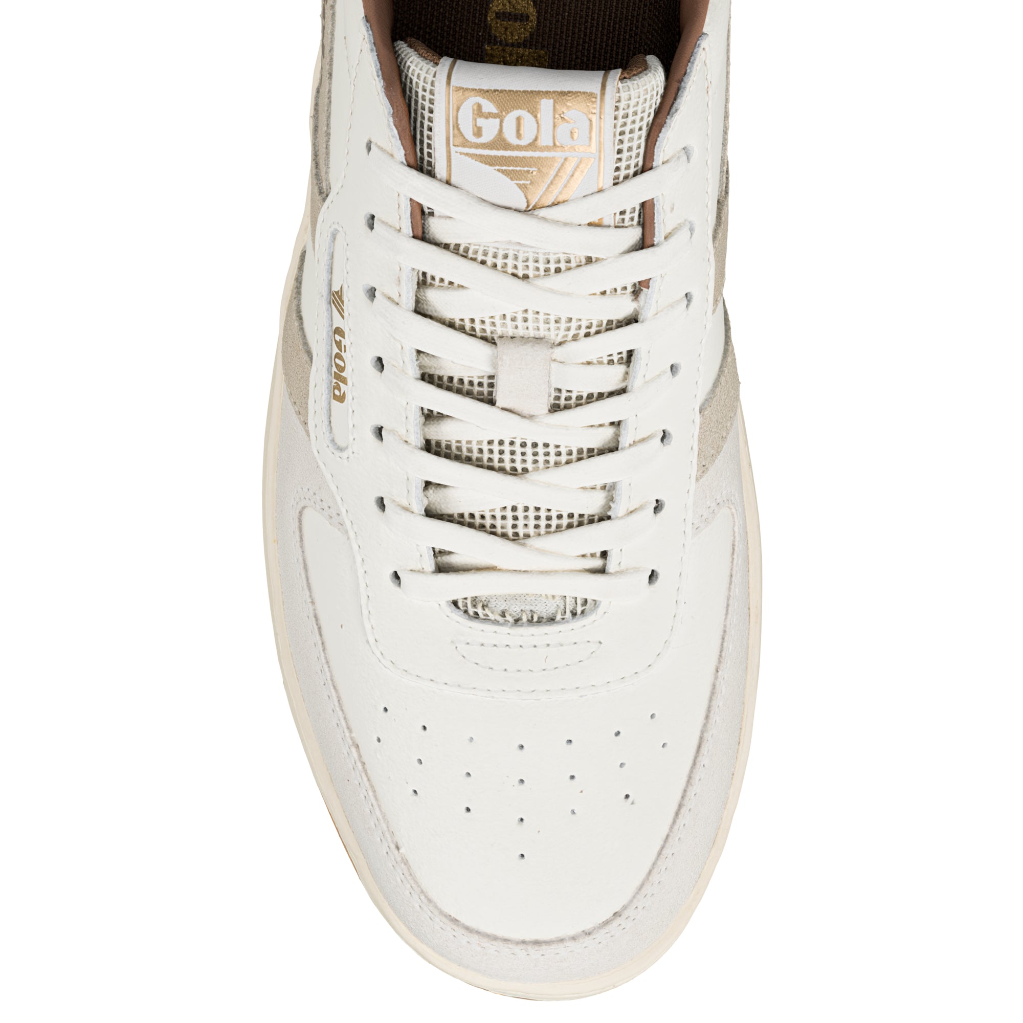 Top view of a white Gola trainer with lace up fastening and gold branding on the tongue