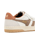 Close up of the heel and side panel of a white and tan Gola trainer with gold branding