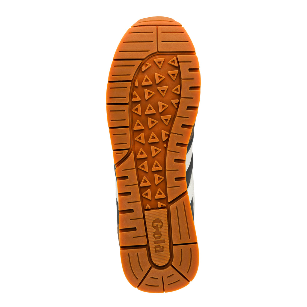 Gum rubber trainer sole with triangular tread pattern and Gola branding