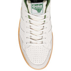 Close up of the front of a white Gola trainer with green trim and white laces