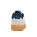 Rear view of a white and blue trainer with a gum sole