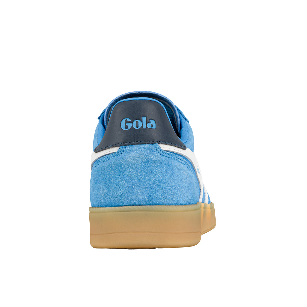 Rear view of a blue suede Gola trainer with a gum rubber sole